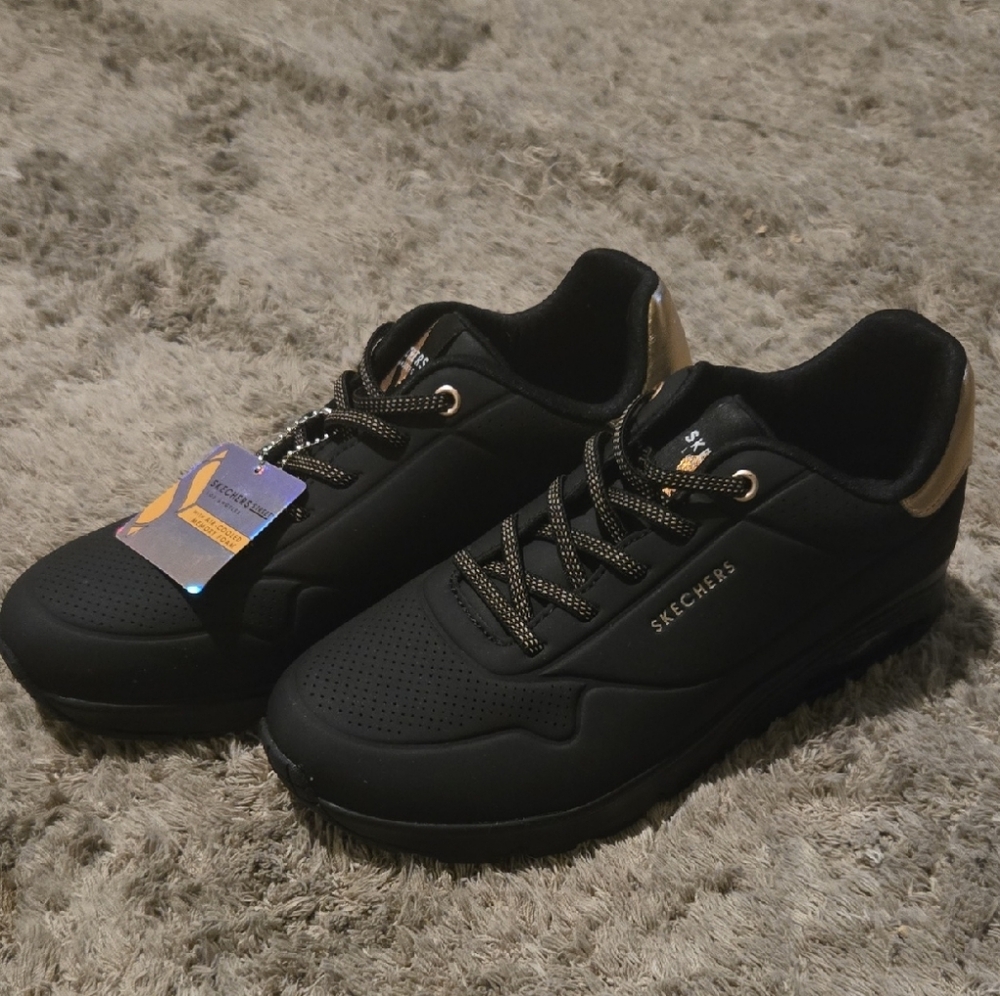 Skechers Womens Black and Gold Slip-On Sneakers